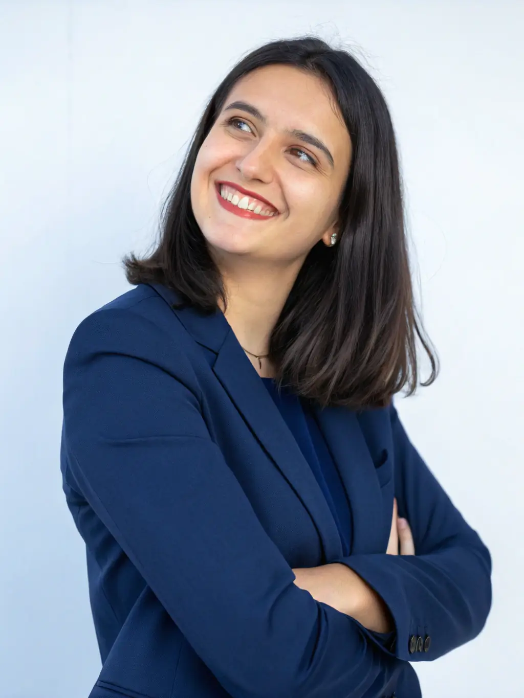 A professional headshot of Rosa Fernández Martínez, smiling confidently, conveying trustworthiness and expertise in legal matters.